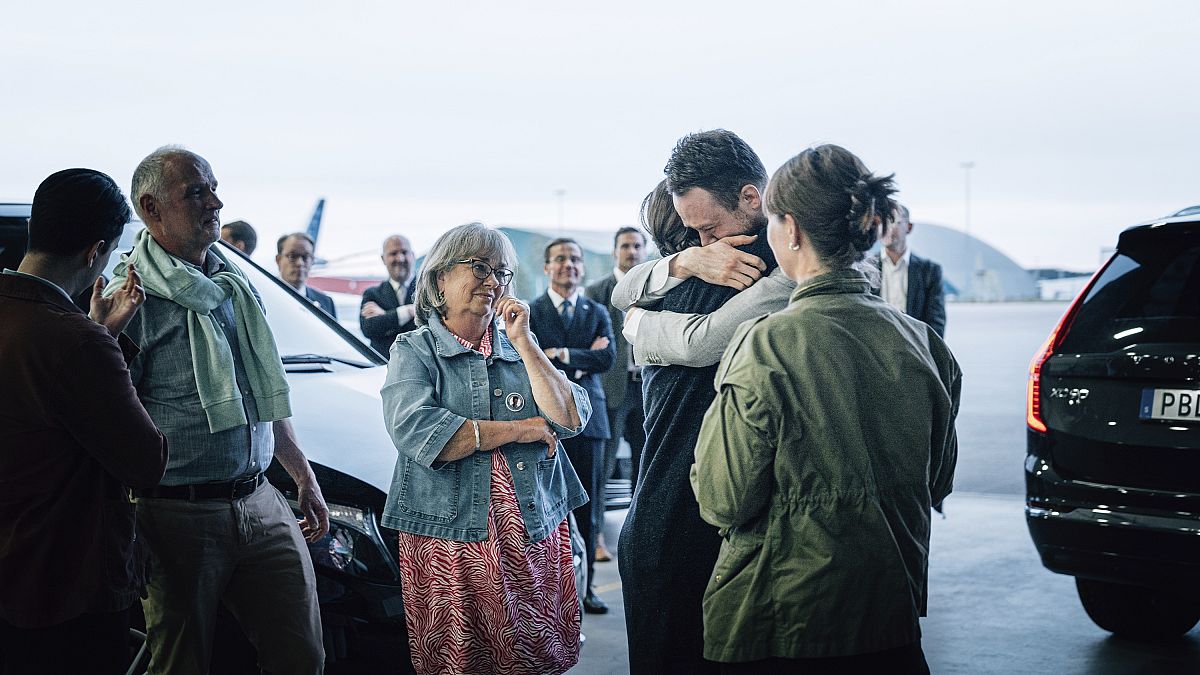 Two Swedish citizens released in prisoner swap with Iran land back in Stockholm 