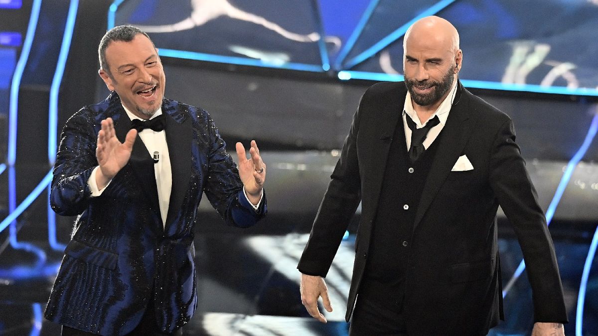 John Travolta's bizarre duck-dance stuns San Remo crowd and gets pulled from Italian TV