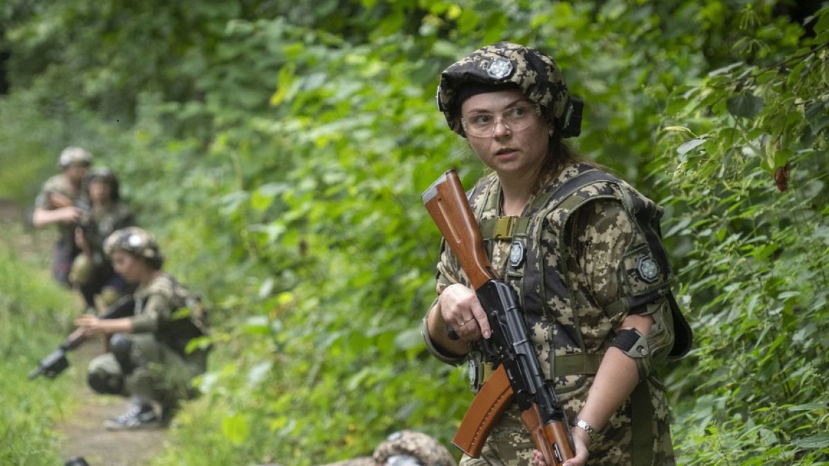 Ukrainian women prepare for combat amid Russia's grinding invasion 
