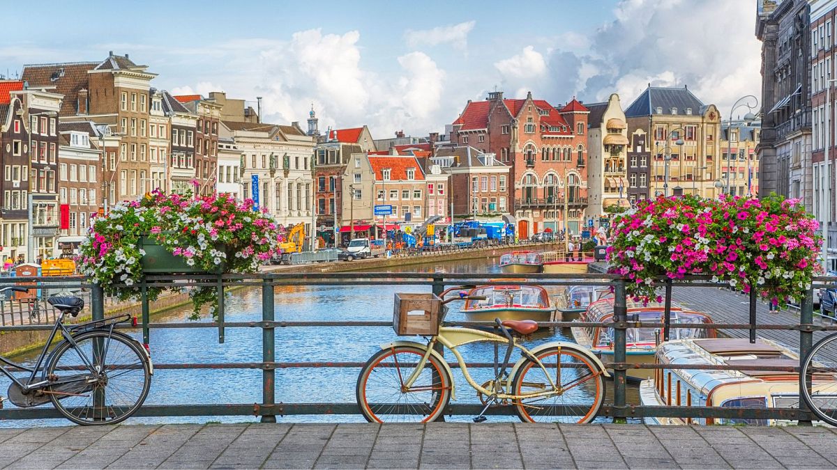 Flowery bikes, eco-living and a rules quiz: Amsterdam paints a new vision of the city for tourists
