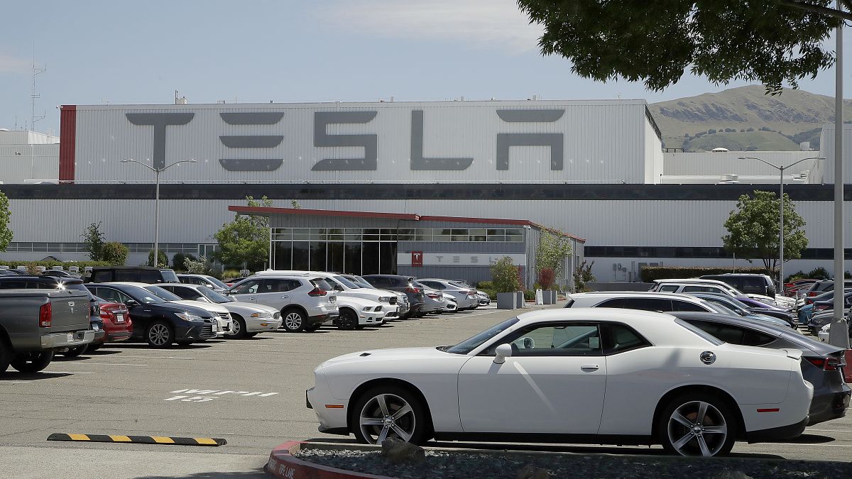 Tesla settles lawsuit over man's death in a crash involving its semi-autonomous driving software