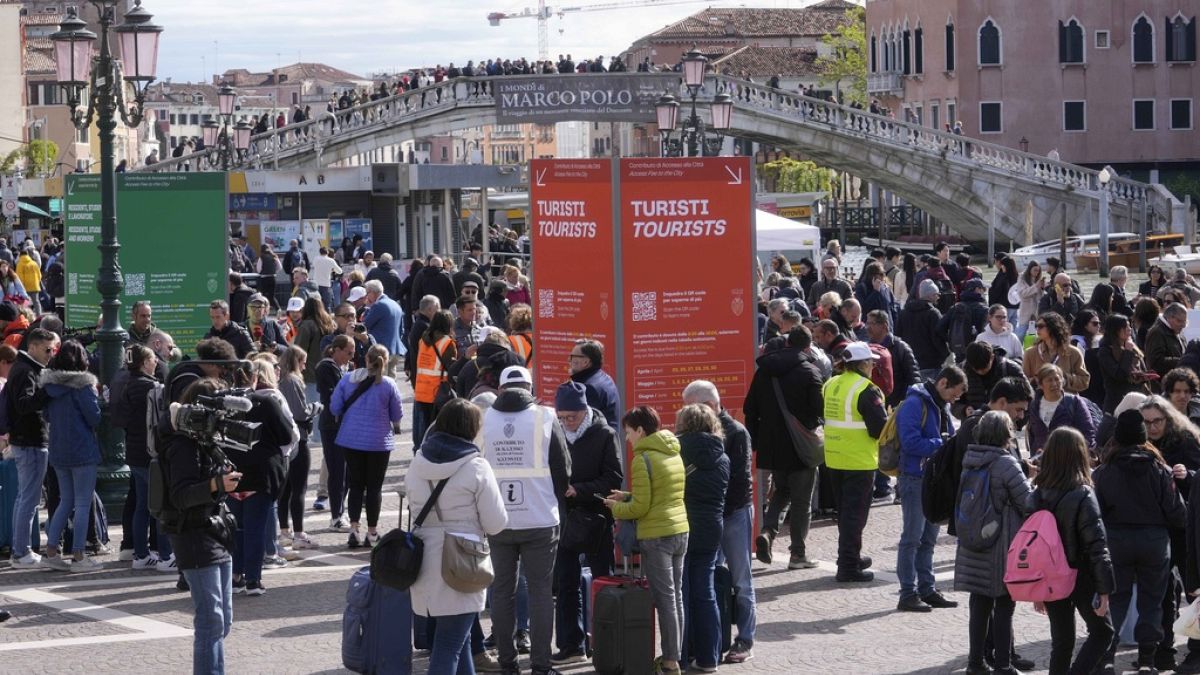 'No to tickets, yes to services and housing': Venetians protest &euro;5 tourist entry fee 