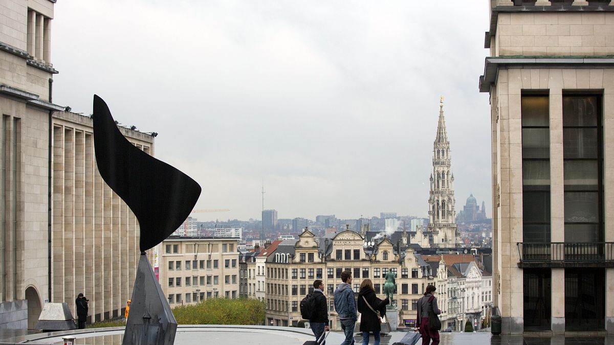 Why do France and Belgium risk credit rating downgrades in 2024?
