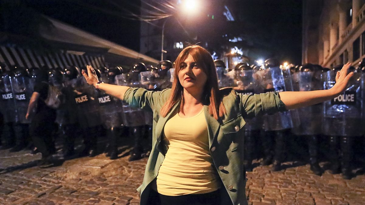 Police beat and arrest Tbilisi protesters as parliament debates controversial transparency law 