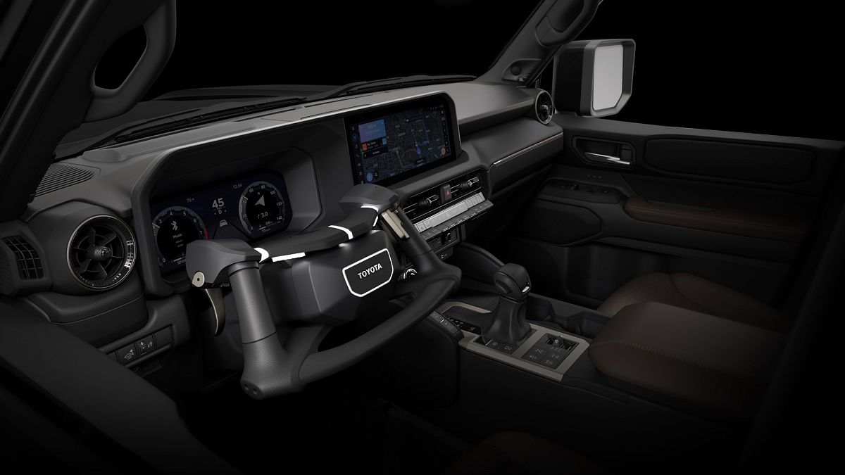 This pedal-free system allows people to drive using only their hands