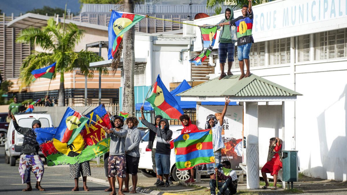 More than 130 arrested and curfew imposed after riots in New Caledonia 