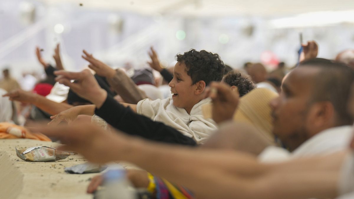 Pilgrims commence final rites of Hajj as Muslims celebrate Eid al-Adha 