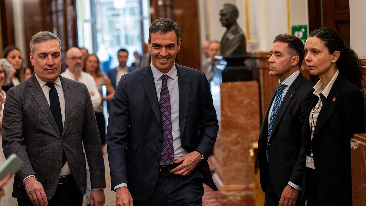 Spain's weary and still divided voters go to the polls once more 