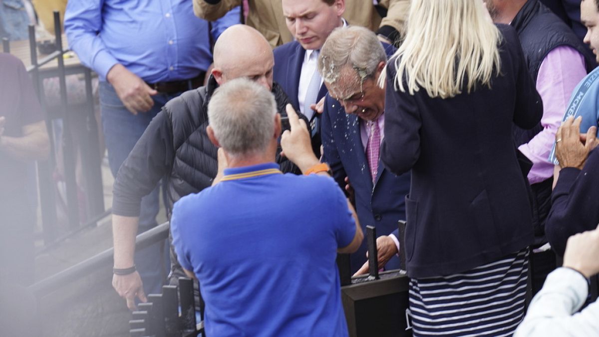 Right-wing British politician Farage doused with milkshake at election campaign 