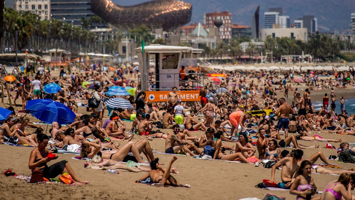 Barcelona grapples with the future of tourism as rain provides last minute drought relief 