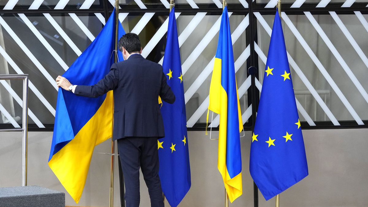 Brussels says Ukraine and Moldova ready for membership talks as Hungary mounts opposition 