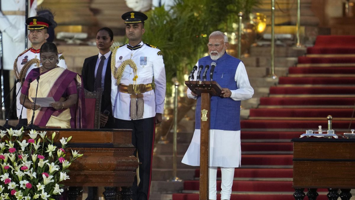 India's PM Narendra Modi sworn in for rare third term after weak election showing