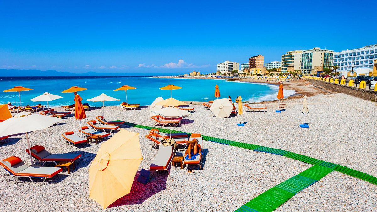 Greek beaches plagued with overcrowding are facing a sunbed crackdown enforced by drones 