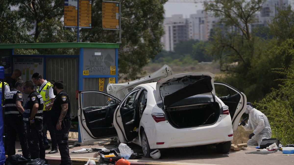 Three people seriously injured after car rams bus stops in Israel 